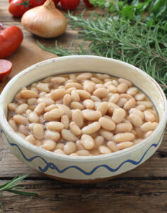 cooked navy beans in a bowl